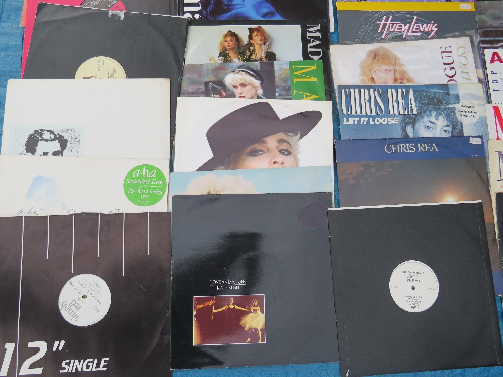 A COLLECTION OF MOSTLY 12" SINGLE RECORDS, various years of issue, artists include Madonna, Madness - Image 4 of 10