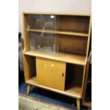 A VINTAGE UTILITY OAK GLAZED BOOKCASE H-120 W-84 CM