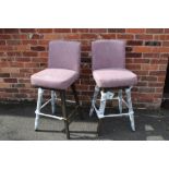A PAIR OF MODERN UPHOLSTERED SWIVEL STOOLS
