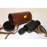 A LEATHER CASED VINTAGE MONOCULAR BY CARL ZEISS