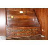 A VINTAGE OAK LETTER RACK MARKED 'THE LONDON AND LANCASHIRE INSURANCE CO LIMITED