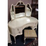 A CREAM LOUIS XV STYLE DRESSING TABLE WITH TRIPLE MIRROR, STOOL AND HEADBOARD