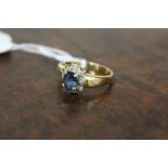 A SAPPHIRE AND DIAMOND RING, set in unmarked yellow metal, approx weight 4.6 g, ring size S