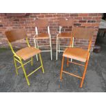 A HARLEQUIN SET OF FOUR MODERN INDUSTRIAL STYLE STOOLS