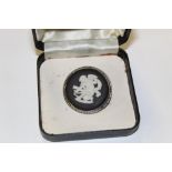 A SILVER AND WEDGWOOD JASPERWARE BROOCH