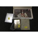 A BOXED VINTAGE MUSICAL COMPACT, TOGETHER WITH A COMMEMORATIVE £5 COIN AND A CIGARETTE CASE