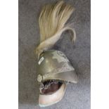 A MONTGOMERYSHIRE YEOMANRY HELMET, with metal chin strap, fabric liner, spike and horse hair