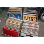 FOUR BOXES OF ASSORTED LP RECORDS ETC. TO INCLUDE HEART, RAINBOW YES ETC