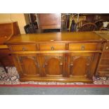 A REPRODUCTION OAK CARVED SIDEBOARD W-137 CM