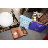 TWO BOXES OF MODERN HOUSEHOLD SUNDRIES TO INCLUDE A TABLE LAMP, MODERN WALL CLOCK ETC