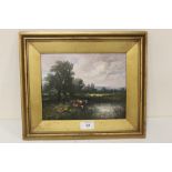 (XIX XX). An impressionist wooded river landscape with cattle, hills beyond. Signed lower right, oil