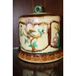 A MAJOLICA CHEESE DOME, decorated with birds, plants and insects, H 26 cmCondition Report:crazing