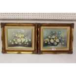 A PAIR OF GILT FRAMED FLORAL OIL ON CANVAS SIGNED T HANSEN 25.5 CM BY 21 CM