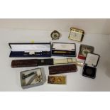 A BOX OF COLLECTABLES TO INCLUDE PEN KNIVES, CLOCKS, YELLOW METAL CHAIN, ROLLED GOLD PENCILS ETC.