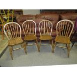 A SET OF FOUR HOOP BACK TRADITIONAL KITCHEN CHAIRS - THREE STAMPED 'T.W OR F.L'