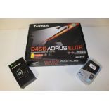 AN AORUS B450 ELITE GAMING MOTHERBOARD TOGETHER WITH A BOXED SMART WATCH AND A PAYPAL CARD READER