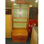 A RETRO TEAK ;G-PLAN' GLAZED BOOKCASE WITH CUPBOARD BELOW H-212 CM W-84 CM