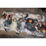 A LARGE BOX OF PORCELAIN HEADED DOLLS - APPROX 39