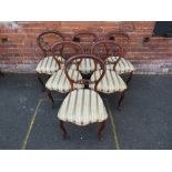 A SET OF SIX 19TH CENTURY ROSEWOOD DINING CHAIRS, raised on cabriole supports