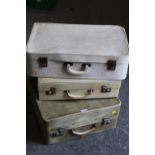 THREE VINTAGE CREAM SUITCASES