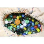 A BAG OF VINTAGE MARBLES