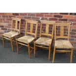 A SET OF FOUR CHURCH/SCHOOL STYLE WICKER SEAT CHAIRS