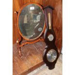 AN EDWARDIAN STYLE MAHOGANY DRESSING TABLE MIRROR, TOGETHER WITH A REPRODUCTION BAROMETER (2)