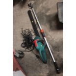 A BOSCH 55-245 ELECTRIC HEDGE TRIMMER TOGETHER WITH A PRUNER