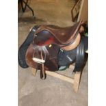 AN M & J SADDLERY HORSE RIDING SADDLE AND STAND