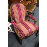 A 19TH CENTURY WALNUT UPHOLSTERED GENTLEMANS OPEN ARMCHAIR, raised on cabriole supports with