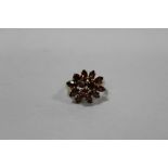 A HALLMARKED 9 CARAT GOLD CLUSTER RING SET WITH GARNETS, RING SIZE P, APPROX WEIGHT 3.6G
