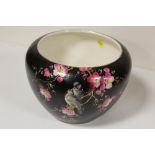 A TOKIO HAND PAINTED CERAMIC JARDINAIRE DECORATED WITH BIRDS AND FLOWERS