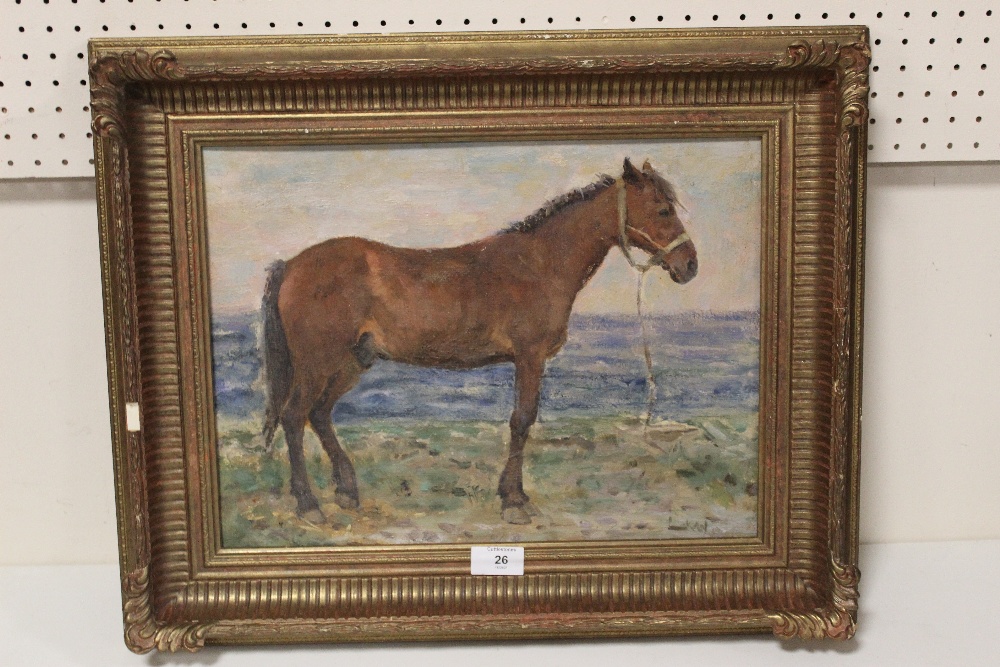 L.K.W. (XX). An impressionist beach scene with horse. signed with initials lower right, oil on