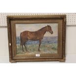 L.K.W. (XX). An impressionist beach scene with horse. signed with initials lower right, oil on