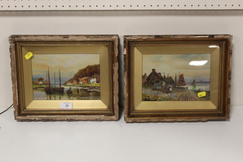 A PAIR OF ANTIQUE GILT FRAMED OILS ON BOARDS DEPICTING HARBOUR SCENES WITH FIGURES INITIALLED