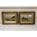 A PAIR OF ANTIQUE GILT FRAMED OILS ON BOARDS DEPICTING HARBOUR SCENES WITH FIGURES INITIALLED