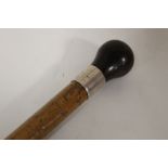 A VINTAGE HALLMARKED SILVER BANDED WALKING CANE