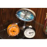 A RETRO RYTHM ALARM CLOCK ON CHROME EFFECT BASE, TOGETHER WITH TWO OTHER ALARM CLOCKS (3)