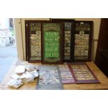 A SELECTION OF FRAMED AND GLAZED PLAYERS CIGARETTE CARDS, TOGETHER WITH A BAG OF UNFRAMED EXAMPLES