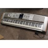 A YAMAHA DGX-505 PORTABLE MULTI EFFECTS GRAND KEYBOARD / PIANO WITH MEMORY CARD,MAINS ADAPTER AND