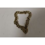 A HALLMARKED 9 CARAT GOLD BRACELET WITH HEART LOCK, APPROX WEIGHT 13.5G