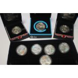 TWO CASED 2012 OLYMPICS SILVER PROOF £5 CROWNS, a cased silver 2012 Paralympics £5 crown and five