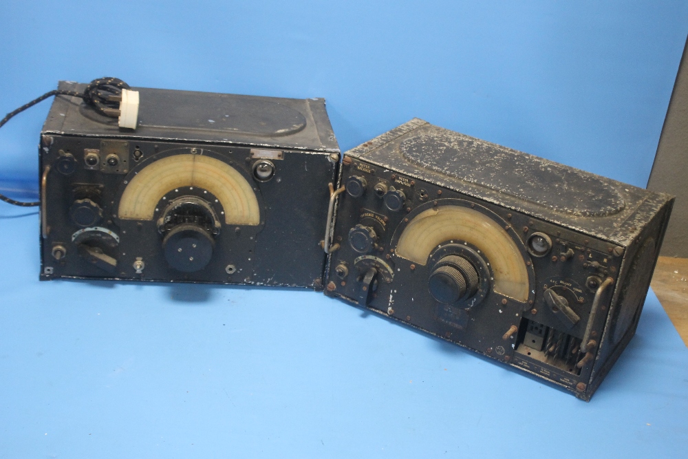 A PAIR OF WWII RAF LANCASTER BOMBER RADIO RECEIVERS in steel cases