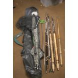 A SELECTION OF FISHING RODS, ROD RESTS ETC., to include a Shakespear Match International x 2 etc.