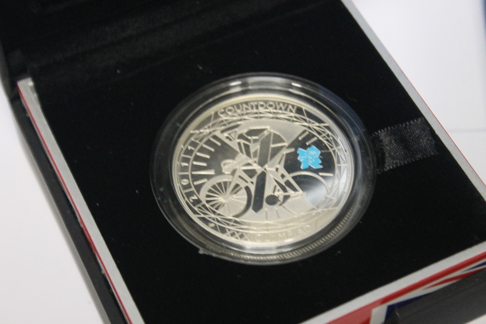 TWO CASED 2012 OLYMPICS SILVER PROOF £5 CROWNS, a cased silver 2012 Paralympics £5 crown and five - Image 2 of 2