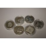 SIX CROWN SIZED SILVER COINS IN CAPSULES, to include 2007 and 2010 1 oz Britannias and a 2002 QEI