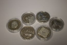SIX CROWN SIZED SILVER COINS IN CAPSULES, to include 2007 and 2010 1 oz Britannias and a 2002 QEI
