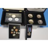 A 2011 ROYAL WEDDING SILVER THREE COIN SET and a 2008 proof set; Battle of Waterloo four piece