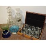 TWO TRAYS OF ASSORTED GLASSWARE, to include decanters, Bristol blue glass, boxed set of vintage cars