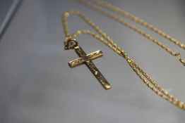 A HALLMARKED 9CT PENDANT CROSS AND CHAIN, the cross bearing hallmarks to reverse, the chain marked 9